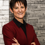 Dr Odette Koch standing in her orthopaedic office